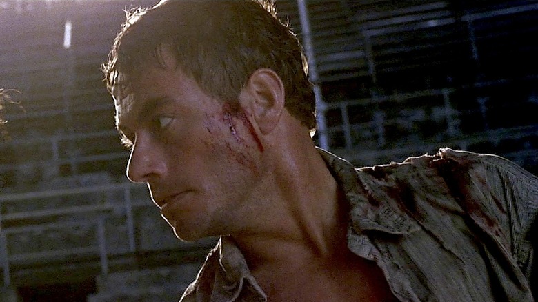 Jean-Claude Van Damme bleeding and sweaty