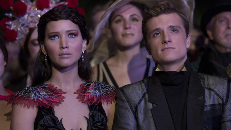 Katniss and Peeta watching