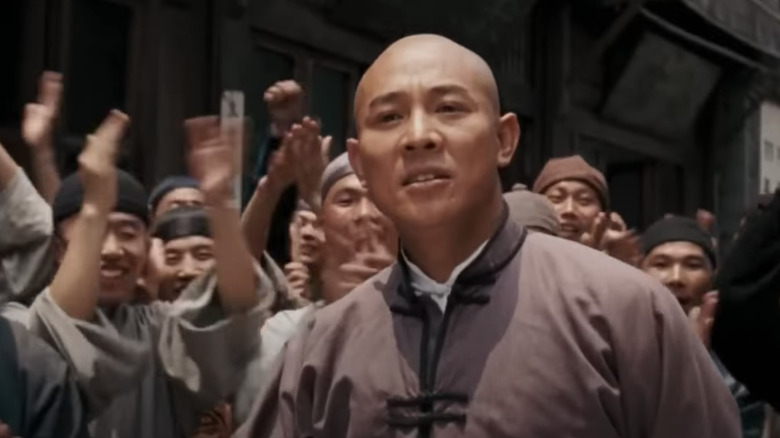 Jet Li in front of cheering crowd