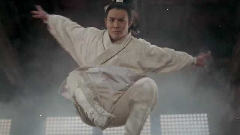 Jet Li leaping through air