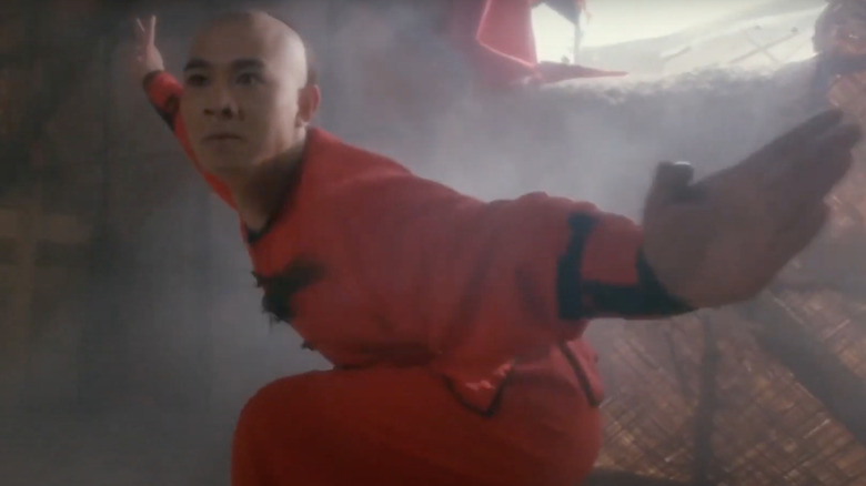 Jet Li wearing red mid-fight