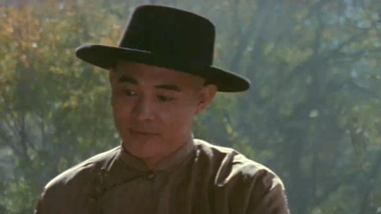 Jet Li wearing wide-brimmed hat