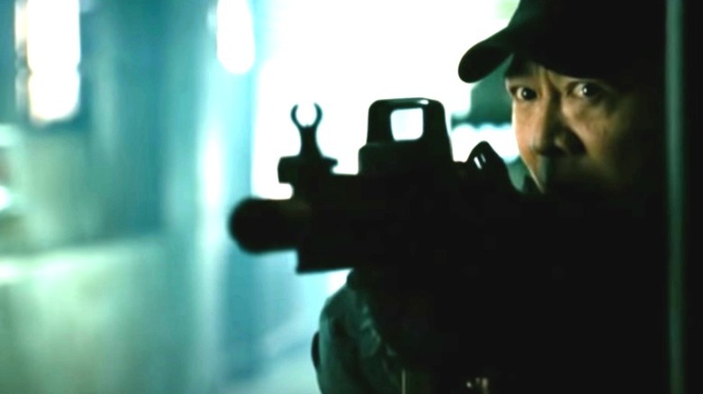 Jet Li aiming gun