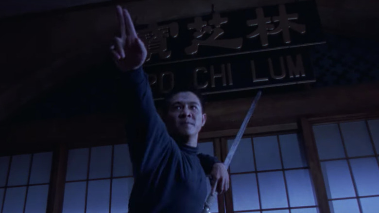 Jet Li pointing two fingers