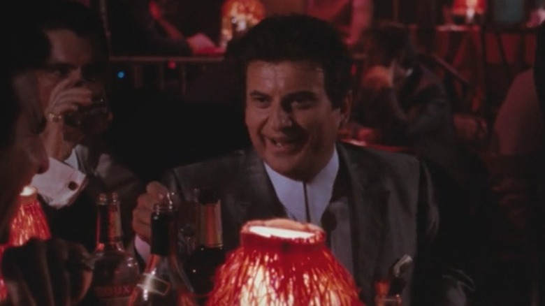 Joe Pesci laughing drinking