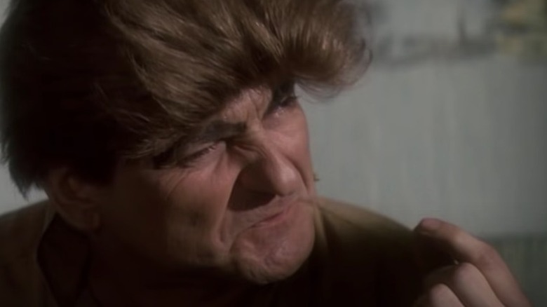 Joe Pesci wig wincing 