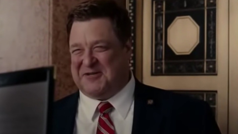 John Goodman with red tie