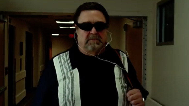 John Goodman wearing bowling shirt