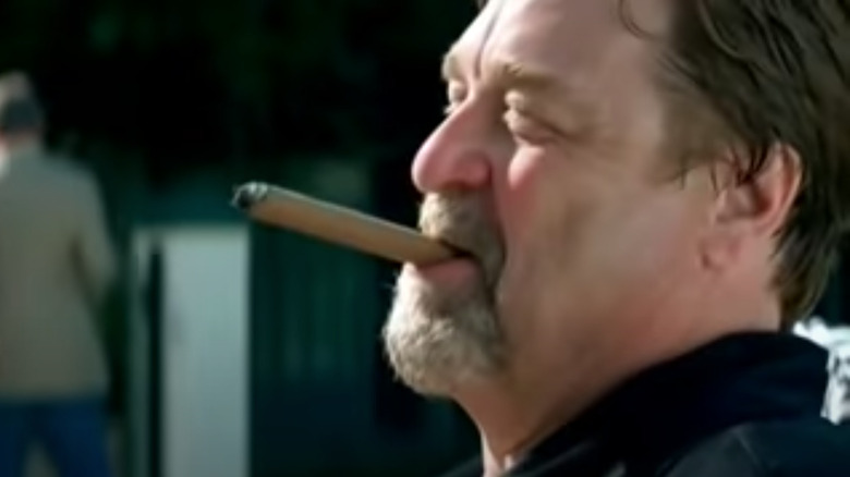 John Goodman smoking cigar