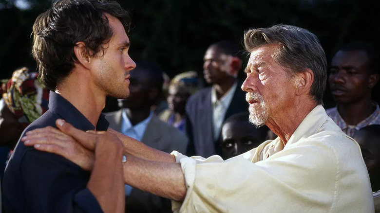 Christopher holds Conner in front of a crowd