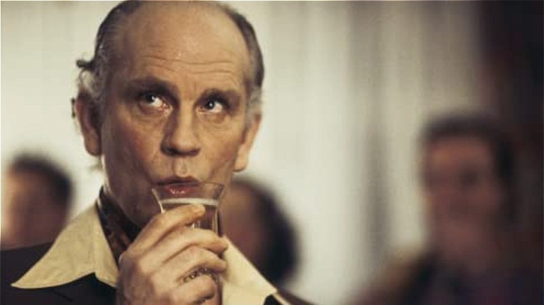 malkovich sipping champagne/color me kubrick