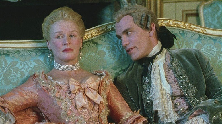 malkovich and close on couch in period costume/dangerous liaisons