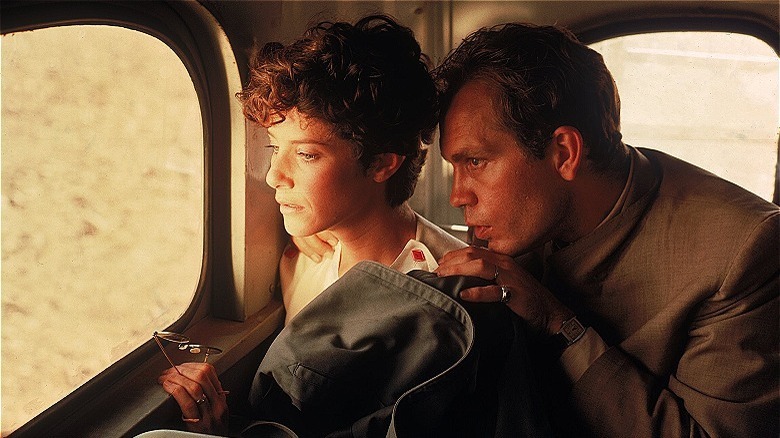 winger and malkovich on a train/ sheltering sky