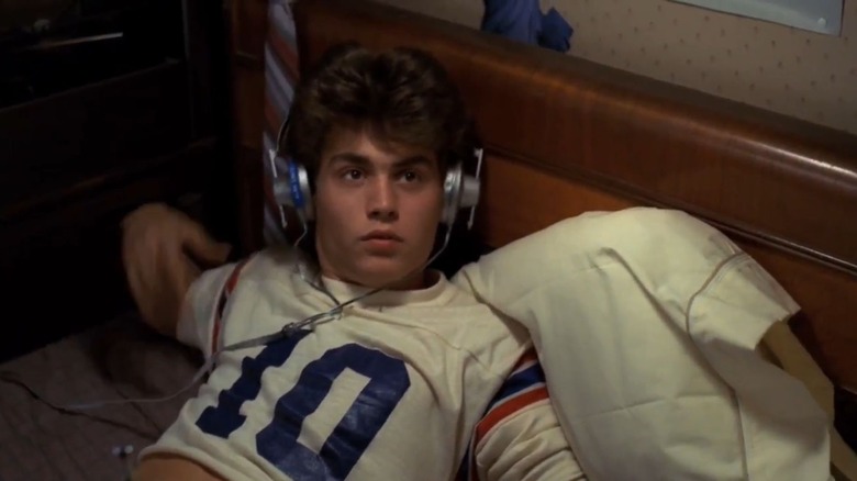 Young Johnny Depp with headphones