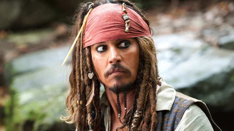 Captain Jack Sparrow looking sideways in Pirates of the Caribbean: On Stranger Tides