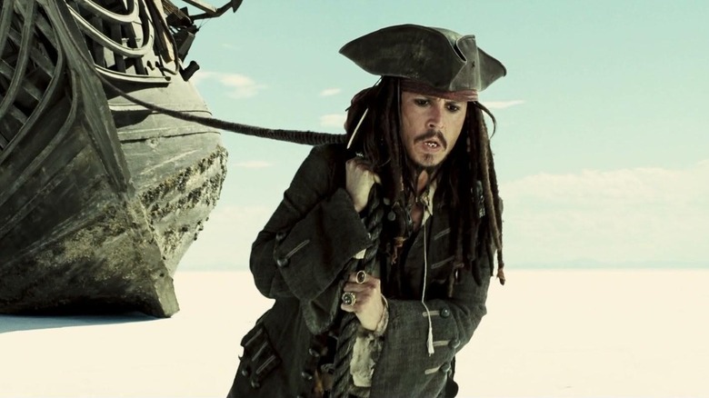 Jack Sparrow pulls a boat in "Pirates Of The Caribbean: At World's End" (2007)