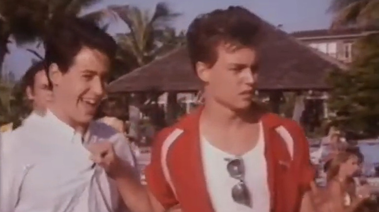 Johnny Depp in red shirt in Private Resort