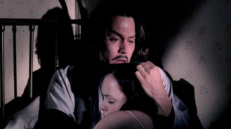 Cesar hugs Suzie in "The Man Who Cried" (2000)