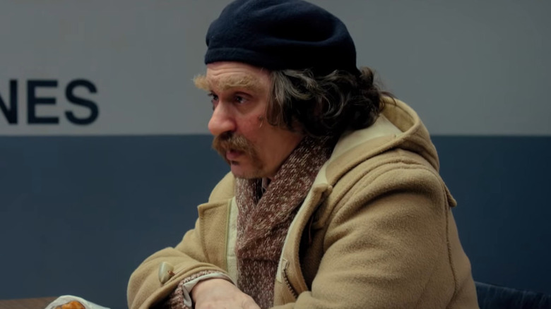 Guy Lapointe in discussion in "Yoga Hosers" (2016)