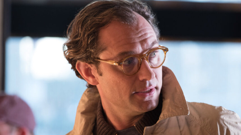 Jude Law wearing glasses