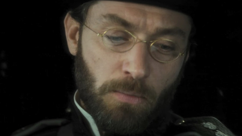 Jude Law with glasses and beard