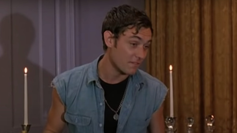 Jude Law wearing denim vest