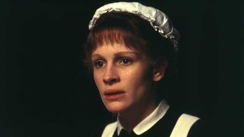 Mary looks scared in a maid's uniform in "Mary Reilly" (1996)