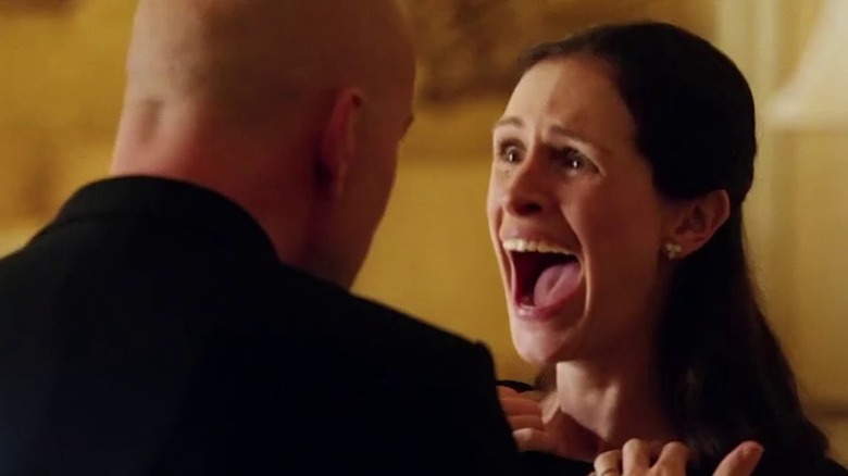 Tess Ocean reacts in surprise to Bruce Willis in "Ocean's Twelve" (2004)