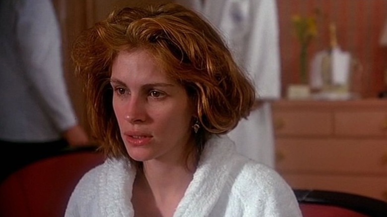 Julia Roberts looking upset in a bathrobe 