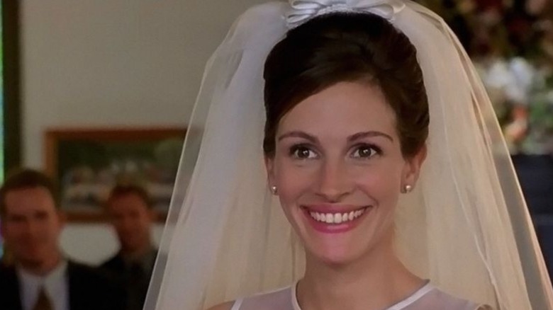 Maggie beams in a wedding dress in "Runaway Bride" (1999)