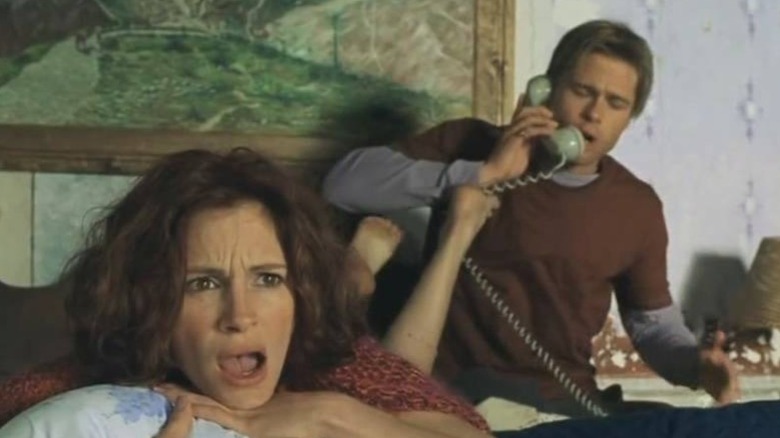 Samantha lies on a bed with Jerry on the phone in "The Mexican" (2001)