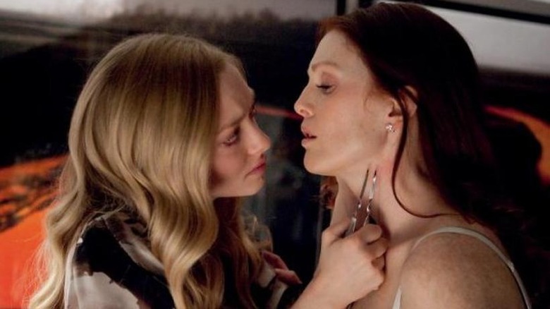 Chloe holds Catherine at knifepoint in 2009's "Chloe"