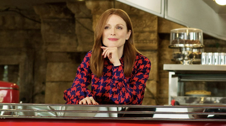 Poppy Adams behind a counter in 2017's "Kingsman: The Golden Circle"