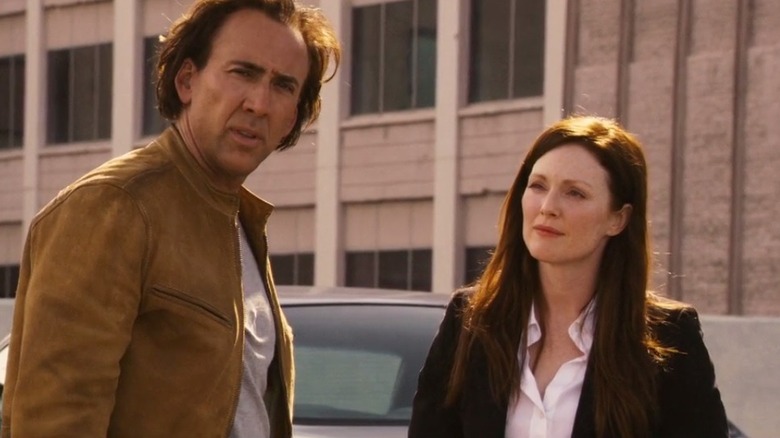 Julianne Moore looking at Nicolas Cage