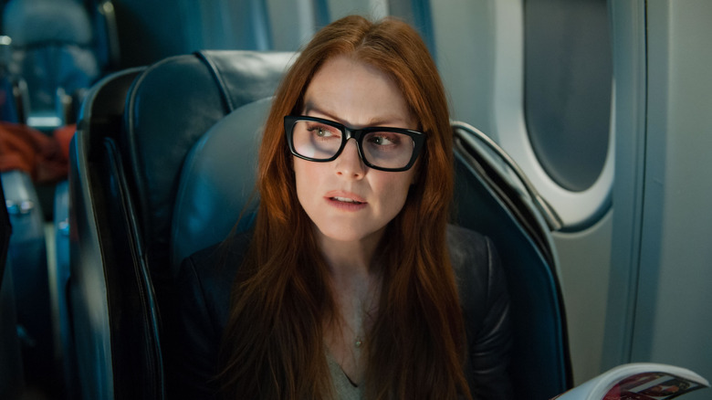 Jen Summers on an airplane in "Non-Stop" (2014)