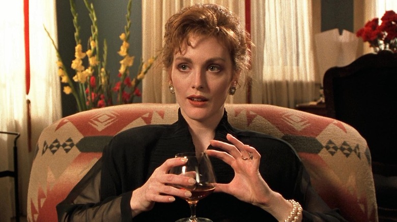 Susan nurses a drink in 1990's "Tales from the Darkside: The Movie"