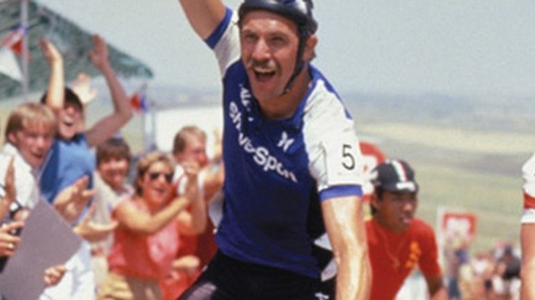 Kevin Costner riding bike