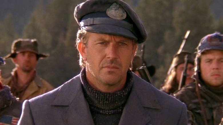 Kevin Costner dressed as postman