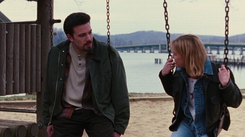 Holden and Alyssa on the swing set