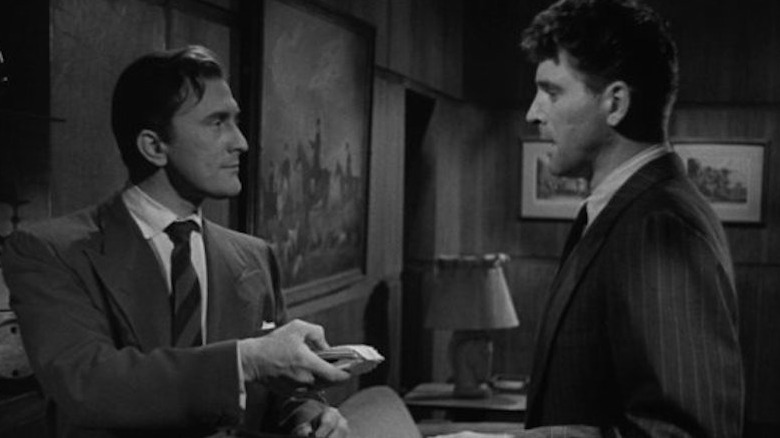 kirk douglas hands burt lancaster a wad of cash