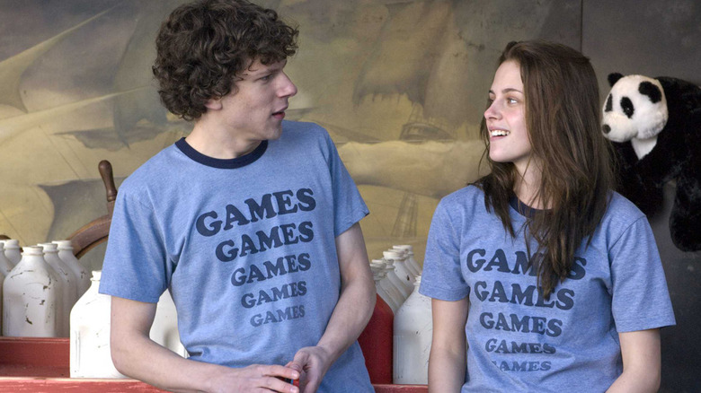 Jesse Eisenberg and Kristen Stewart look at each other