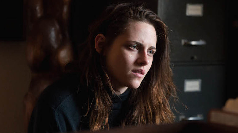 Upset Kristen Stewart sits