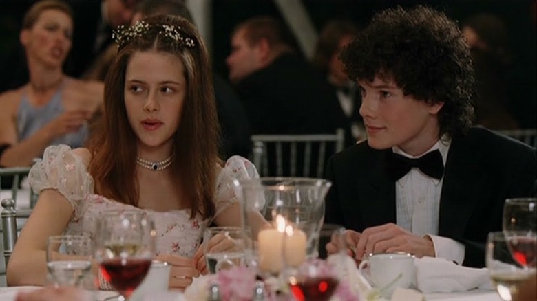 Anton Yelchin and Kristen Stewart sit at table