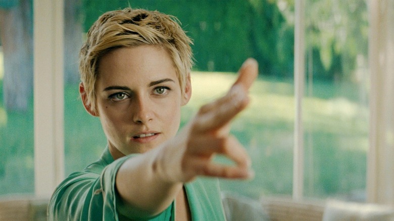 Kristen Stewart points hand like gun