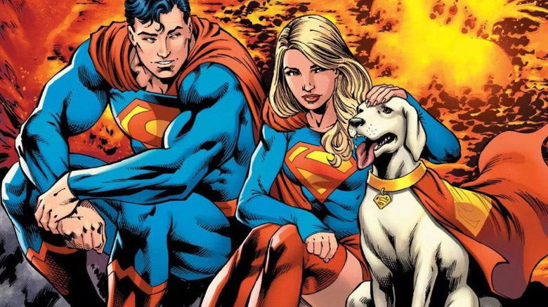 Superman, Supergirl, and Krypto sit by an active volcano