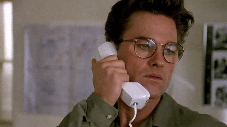 Kurt Russell on the phone