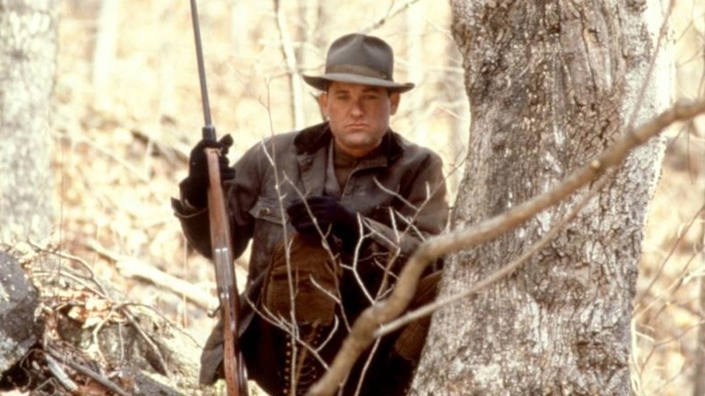 Kurt Russell in the woods