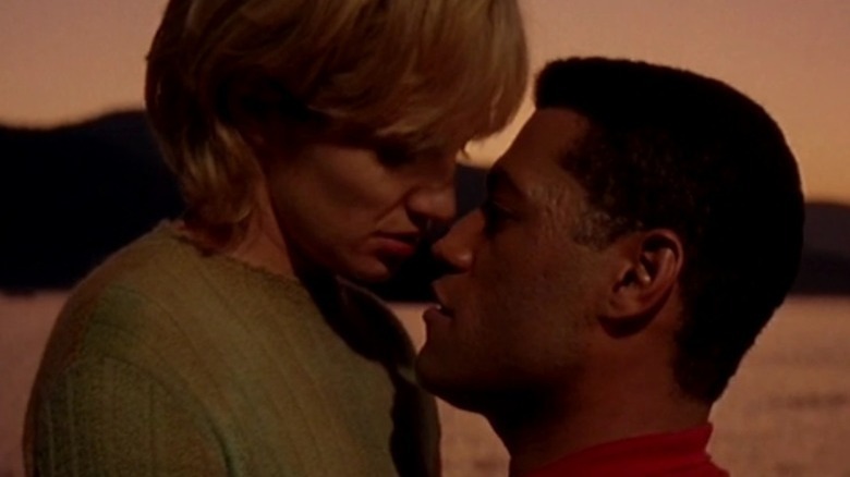 Ellen Barkin and Laurence Fishburne kissing