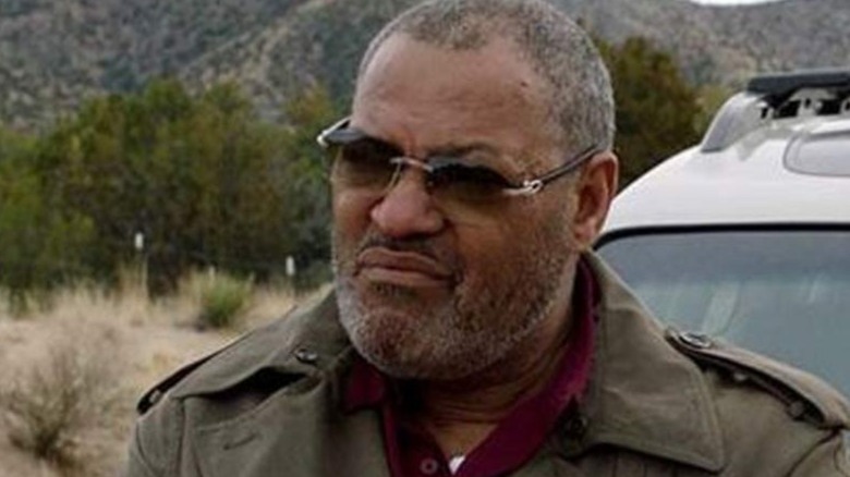 Laurence Fishburne as The Man