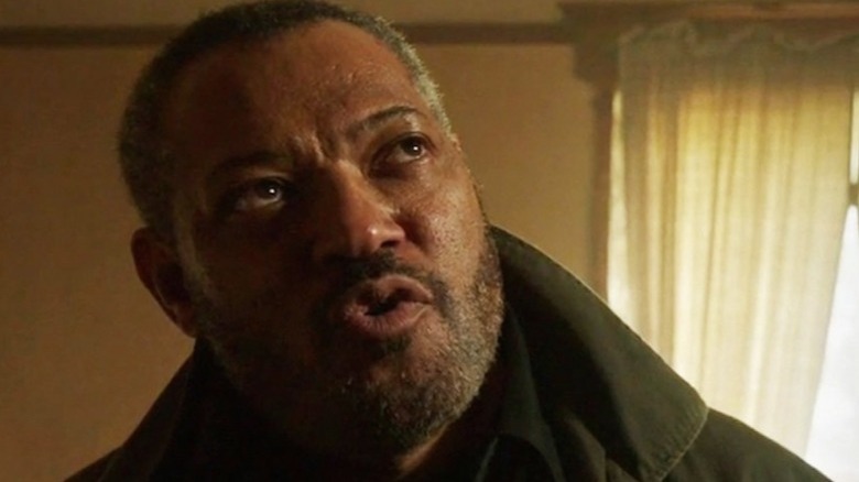 Laurence Fishburne as the Hitman